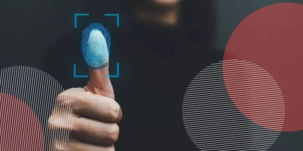 Pessoa pressionando o dedo sobre tela que escaneia sua digital com luz azul